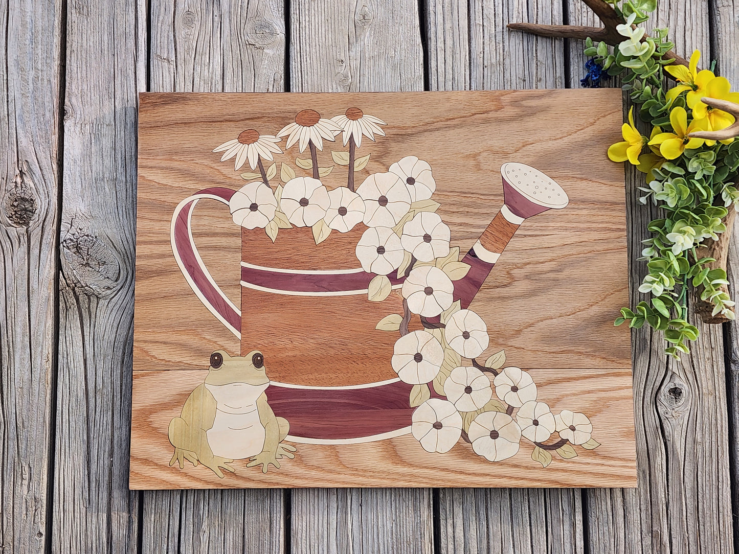 Watering can with frog art
